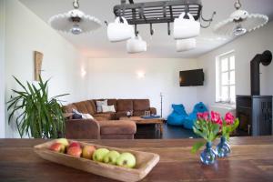 Televiisor ja/või meelelahutuskeskus majutusasutuses Nordsee-Lieblingsort