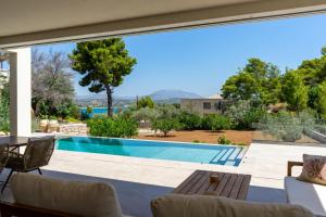Бассейн в Villa Althea in Porto Heli или поблизости