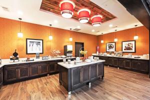 a hair salon with a row of sinks in a room at Hampton Inn & Suites Houston/Atascocita, Tx in Humble