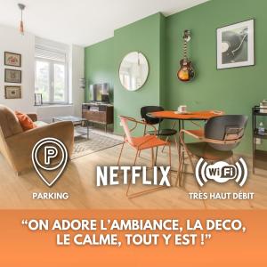 una imagen de una sala de estar con paredes verdes en Le Larsen, en Liévin