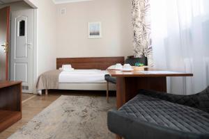 Posteľ alebo postele v izbe v ubytovaní Hotel Polonia