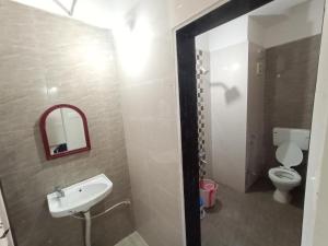 Koupelna v ubytování Snehban Agro Farm Resort + 6 fotografií