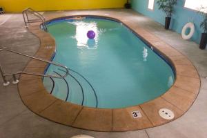 a pool with a ball in the middle of it at Rodeway Inn & Suites North Sioux City I-29 in North Sioux City