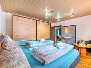 מיטה או מיטות בחדר ב-Holiday Home Hilda by Interhome