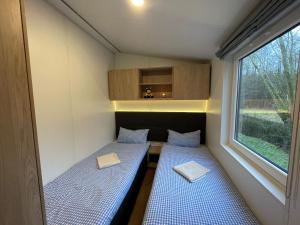 Tempat tidur dalam kamar di Holiday Home Heike by Interhome