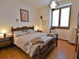 Postel nebo postele na pokoji v ubytování Chalet Chalet Elda by Interhome