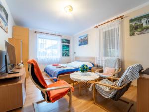 TV a/nebo společenská místnost v ubytování Holiday Home Vrbová Lhota U Aničky by Interhome