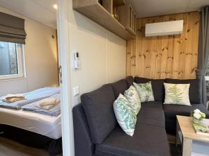 Ένα ή περισσότερα κρεβάτια σε δωμάτιο στο Holiday Home Tiny Haus Paul by Interhome +17 φωτογραφίες