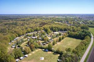 an aerial view of a park with tents and trees at Glamping Drenthe in Meppen