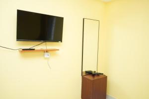 TV a/nebo společenská místnost v ubytování H2 Residency