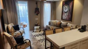 Гостиная зона в Studio Haut standing Casa finance City Tour Vegetale Yasmine Signature Résidence