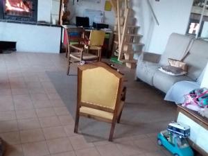 a living room with a couch and a table at Gîte Ruillé-sur-Loir, 4 pièces, 8 personnes - FR-1-410-134 in Ruillé-sur-Loir