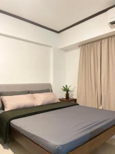 Postel nebo postele na pokoji v ubytování Gentleman's Suite