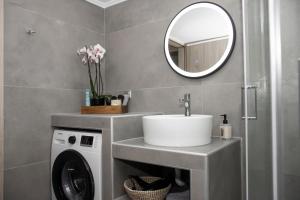 A bathroom at Christina Apartment