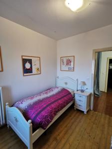 A bed or beds in a room at Agriturismo Le Spezie