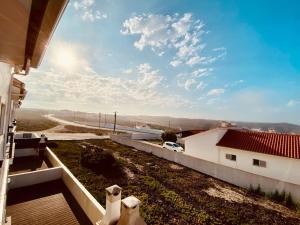 a view from the balcony of a house at Casa da Brisa do Mar in Pataias