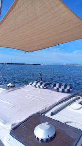a view from the back of a boat in the water at Bed & boat brezza del mare in Viareggio
