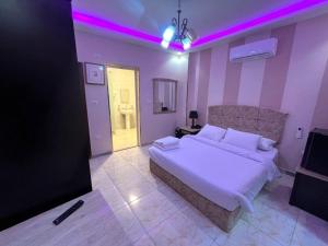 Letto o letti in una camera di Pyramids Nun INN