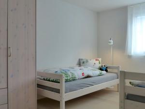 Postel nebo postele na pokoji v ubytování Apartment Feldli by Interhome