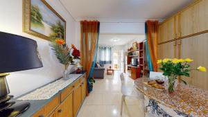 Køkken eller tekøkken på bungalow lux playa gran Alacant