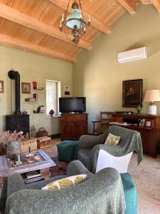 TV a/nebo společenská místnost v ubytování Cascina La Vigna Country House