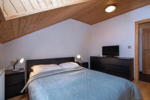 Ein Bett oder Betten in einem Zimmer der Unterkunft Vila 27