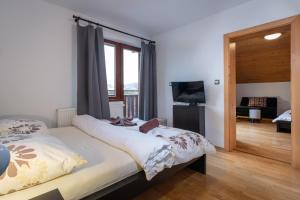Ein Bett oder Betten in einem Zimmer der Unterkunft Vila 27