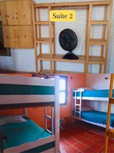 Una cama o camas cuchetas en una habitación  de casa na Taiba - de frente ao mar - piscina - lagoa do kite