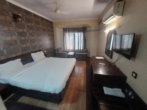 Postel nebo postele na pokoji v ubytování Hotel Maya international