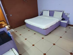 Postel nebo postele na pokoji v ubytování Hotel Maya international