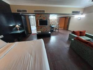 Postel nebo postele na pokoji v ubytování Hotel Maya international