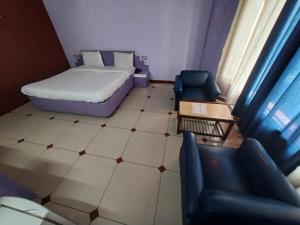 Postel nebo postele na pokoji v ubytování Hotel Maya international