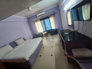 Postel nebo postele na pokoji v ubytování Hotel Maya international