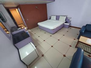 Postel nebo postele na pokoji v ubytování Hotel Maya international