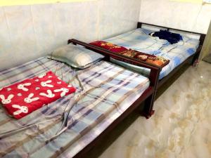 a couple of bunk beds in a room at Countryside Schoolstay in Takeo
