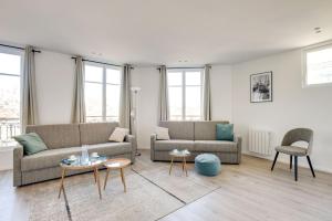 אזור ישיבה ב-157 Suite Sacha - Superb duplex in Paris