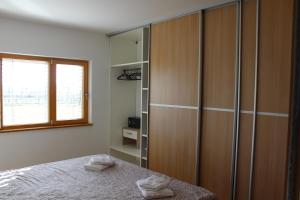 Postel nebo postele na pokoji v ubytování Capo House