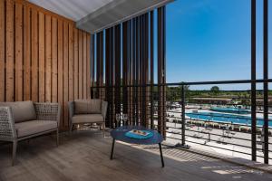 Бассейн в Lino delle Fate Eco Resort или поблизости