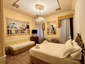 Postel nebo postele na pokoji v ubytování Casa Alla Fenice