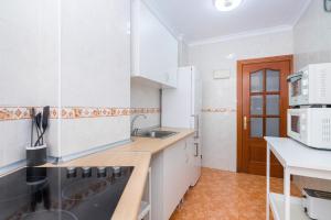 Kuchyňa alebo kuchynka v ubytovaní Impresionante vista al mar - Elegante apartamento