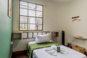 Cama o camas de una habitación en LA PLAYA HOTEL