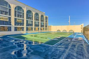 a basketball court in front of a building at Sugar Beach in Gulf Shores