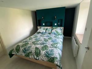 Posteľ alebo postele v izbe v ubytovaní Gîte de charme avec sauna, spa et terrain de pétanque à Plombières-les-Bains, idéal en famille - FR-1-589-432