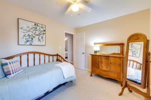 A bed or beds in a room at Charming Emporia Home with Deck and Patio!