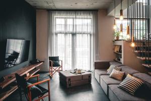 a living room with a couch and a table at Debed Life in Debed