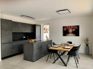 Kuchyň nebo kuchyňský kout v ubytování APPARTEMENT3