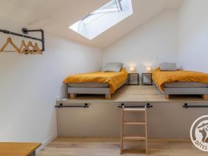 Tempat tidur dalam kamar di Gîte Chalonnes-sur-Loire, 3 pièces, 4 personnes - FR-1-622-61