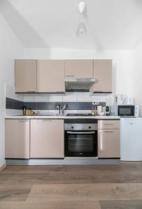 Cuisine ou kitchenette dans l'établissement Résidence Nature - Appartements design en centre ville