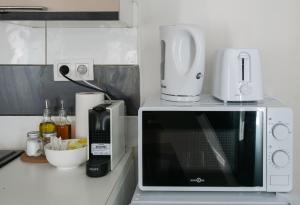 Cuisine ou kitchenette dans l'établissement Résidence Nature - Appartements design en centre ville