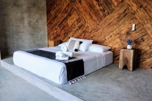 Postel nebo postele na pokoji v ubytování Hotel Macondo Estilo Holbox